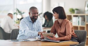 individuals discussing business insurance