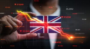 Graph Falling Down in Front Of United Kingdom Flag